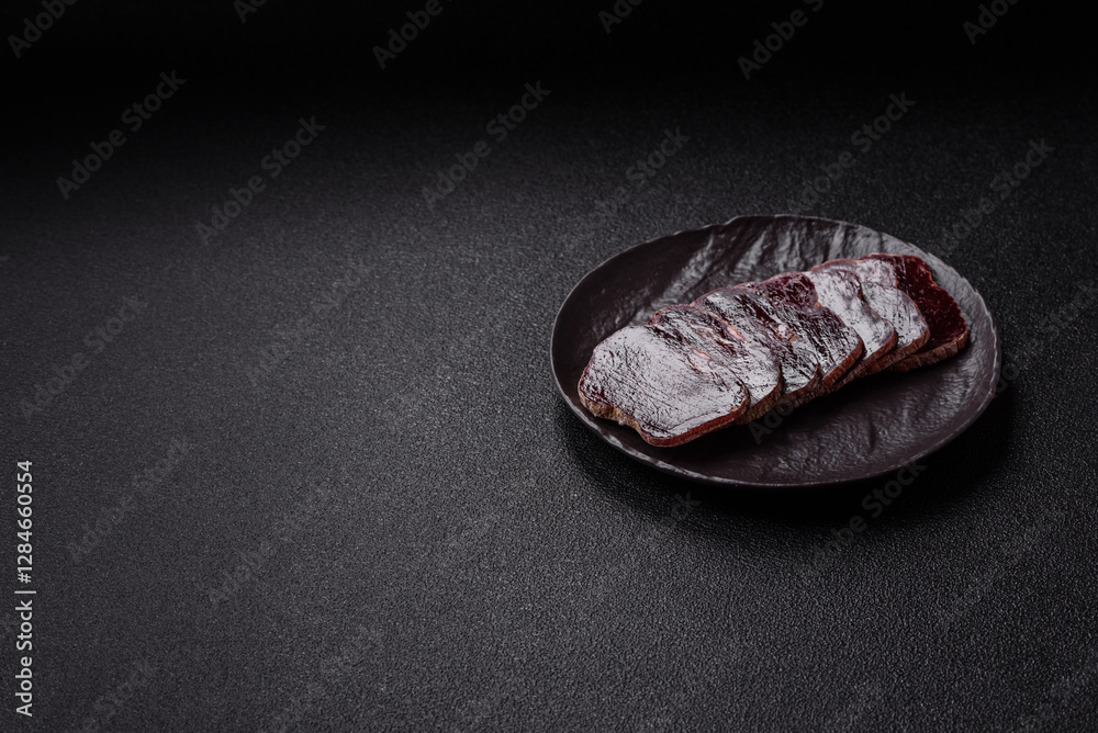 Smoked horse meat with salt, spices and herbs Smoked horse meat with salt, spices and herbs