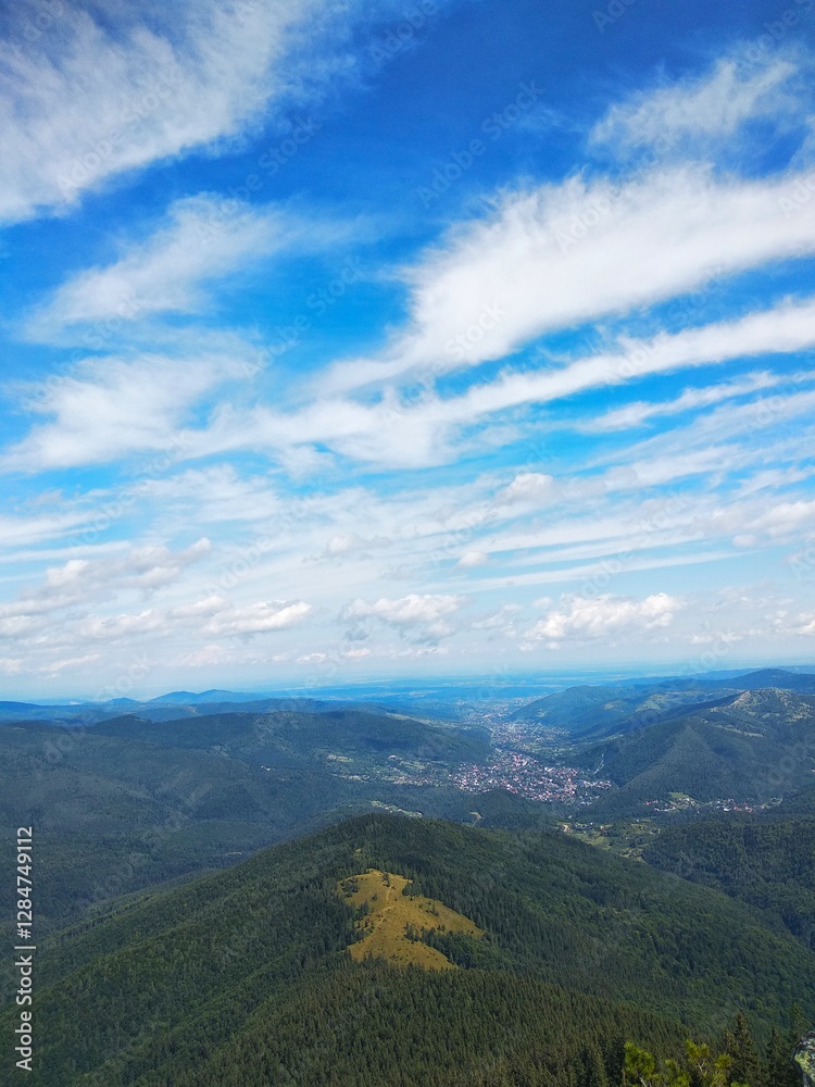 Naklejka premium mountain landscape with clouds