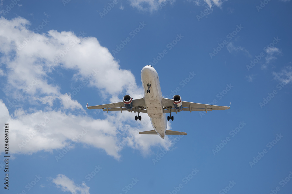 A plane soaring through the sky, symbolizing a journey of hope and new possibilities, with a clear blue backdrop. A plane soaring through the sky, symbolizing a journey of hope and new possibilities, with a clear blue backdrop.
