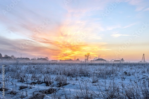 Dawn is in the sky over the village