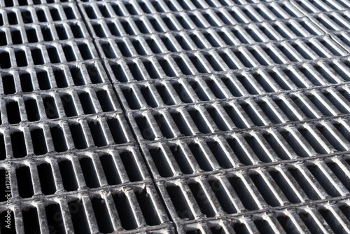 Metal grate for drainage.