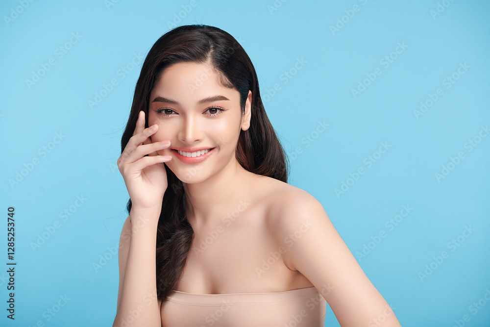 Beautiful Young transgender woman with clean fresh skin on blue background, Face care, Facial treatment, Cosmetology, beauty and spa, transgender women portrait. Beautiful Young transgender woman with clean fresh skin on blue background, Face care, Facial treatment, Cosmetology, beauty and spa, transgender women portrait.