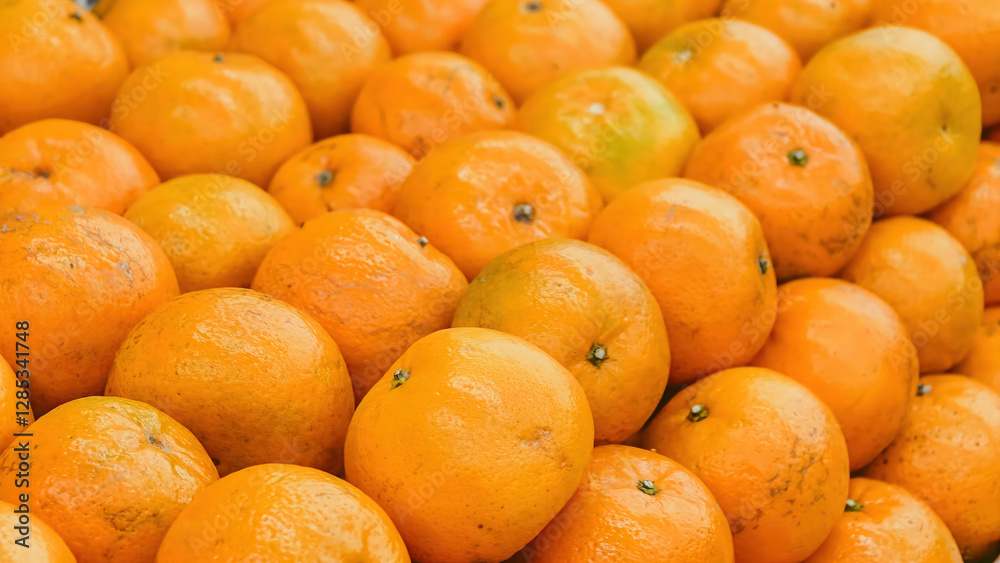Close-up Shot of Fresh Oranges Displayed in Market Stall for Sale Close-up Shot of Fresh Oranges Displayed in Market Stall for Sale