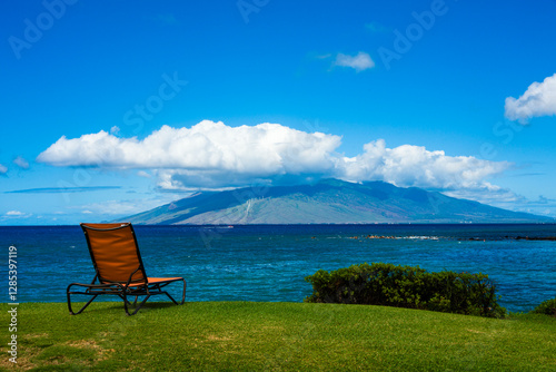Tranquil Oceanfront View of West Maui Mountains from Kaanapali Beach with Beach Chair