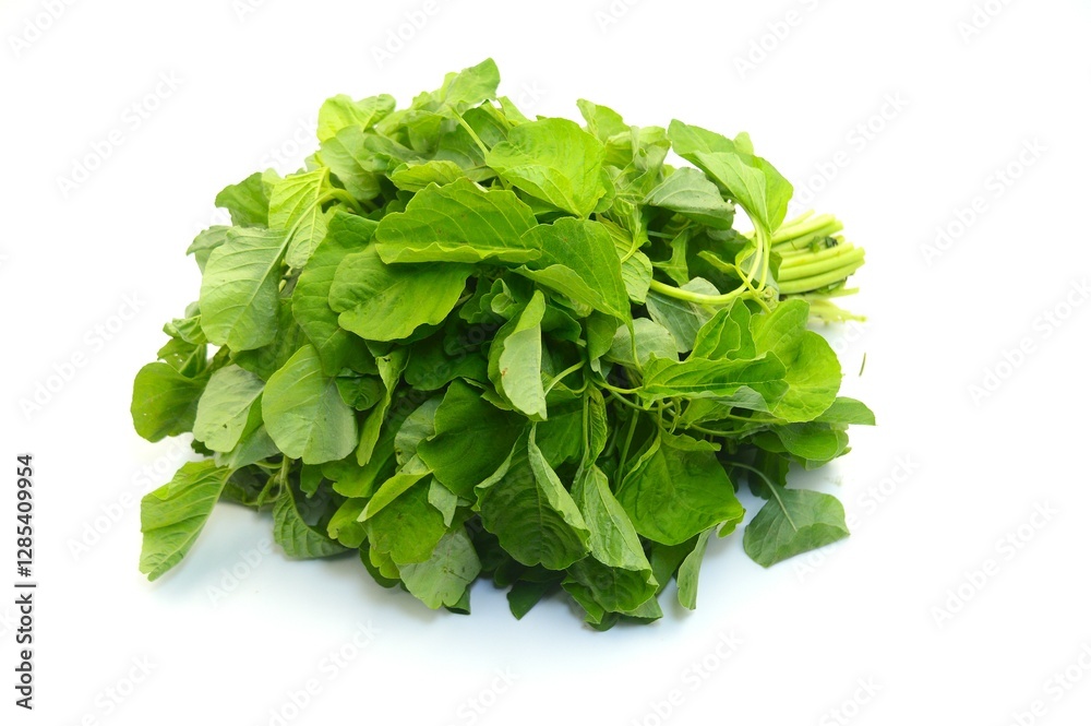 bunch of fresh tropical spinach isolated over white background, suitable for food-related content bunch of fresh tropical spinach isolated over white background, suitable for food-related content