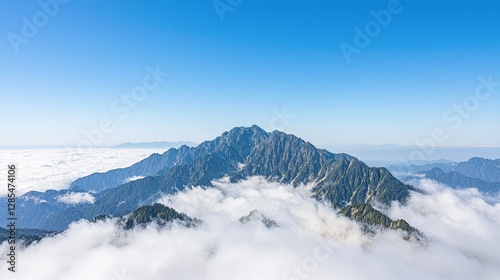 Mountain Top with Serene Clouds on Crystal-Clear Blue Sky