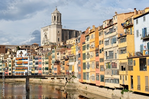 Wallpaper Mural Girona Spain - 25 April 2024 - Colourful houses along Onyar River in front of cathedral in Girona Torontodigital.ca