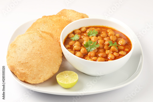 Tableau sur toile Famous Indian Dish Chole Puri in a white ceramic cutlery on white background