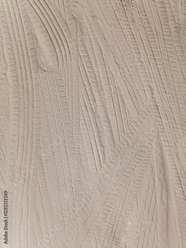 Sandy Surface with Tire Tracks