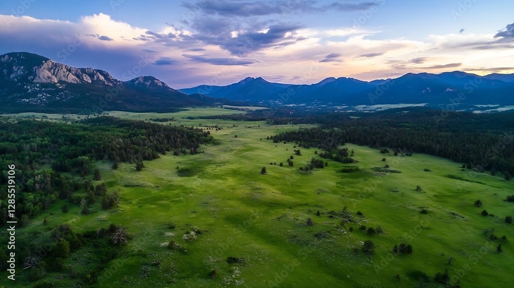 Fototapeta premium Stunning aerial view of lush green fields surrounded by majestic mountains during golden hour : Generative AI