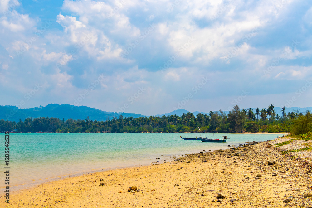 Pakarang Cape tropical beach landscape with boat Khao Lak Thailand. Pakarang Cape tropical beach landscape with boat Khao Lak Thailand.
