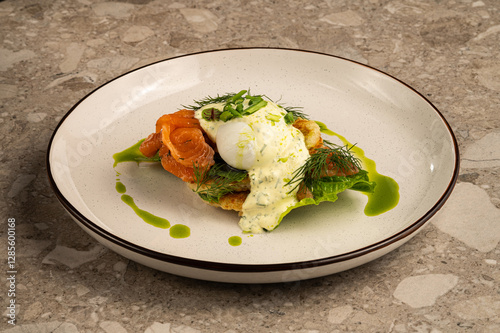 Healthy Breakfast with poached egg, herbs and red fish (salmon) photo