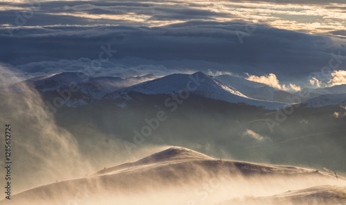 Fototapeta Naklejka Na Ścianę i Meble -  Misty Winter Sunrise in the Bieszczady Mountains