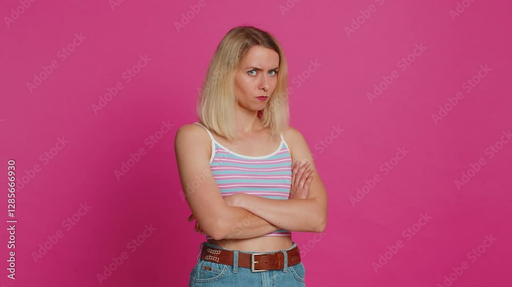 Offended sad nervous Caucasian woman having misunderstanding, frustrated after quarrel, fail, lose, ignores and does not want to communicate, talk. Girl isolated on pink background. People lifestyle Offended sad nervous Caucasian woman having misunderstanding, frustrated after quarrel, fail, lose, ignores and does not want to communicate, talk. Girl isolated on pink background. People lifestyle