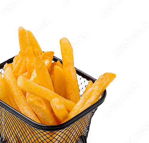 Golden crispy fries served in a wire basket for snacking photo