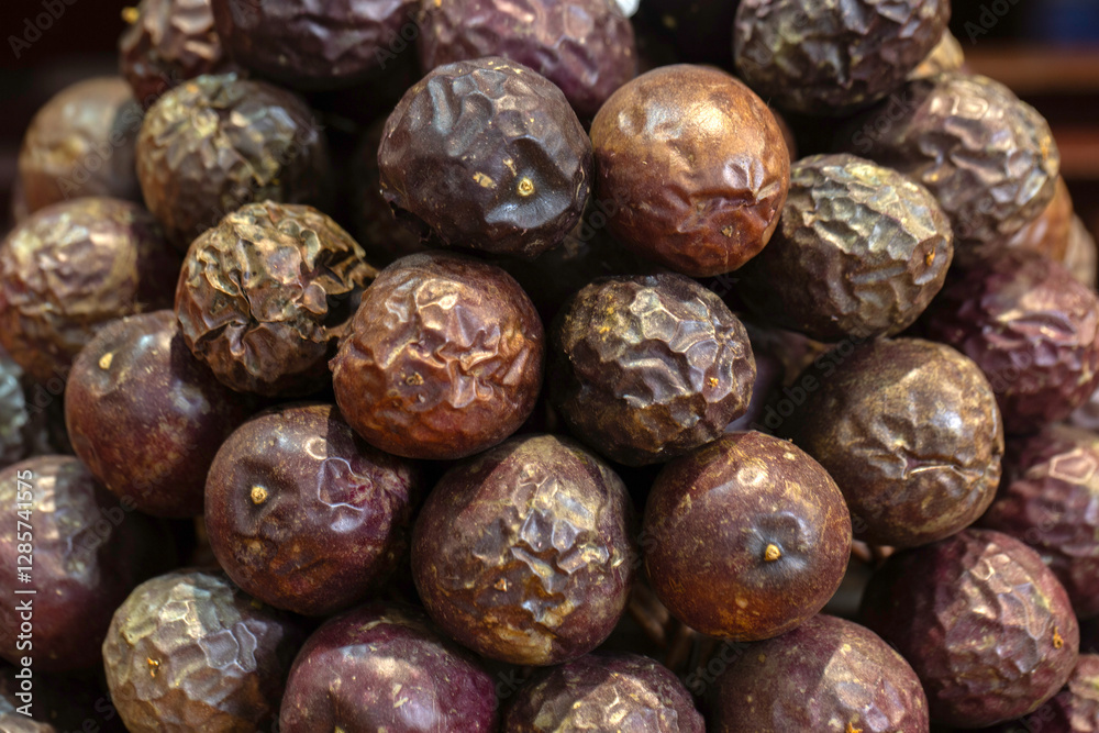 Closeup of fresh ripe Passion Fruits on a market stall Closeup of fresh ripe Passion Fruits on a market stall