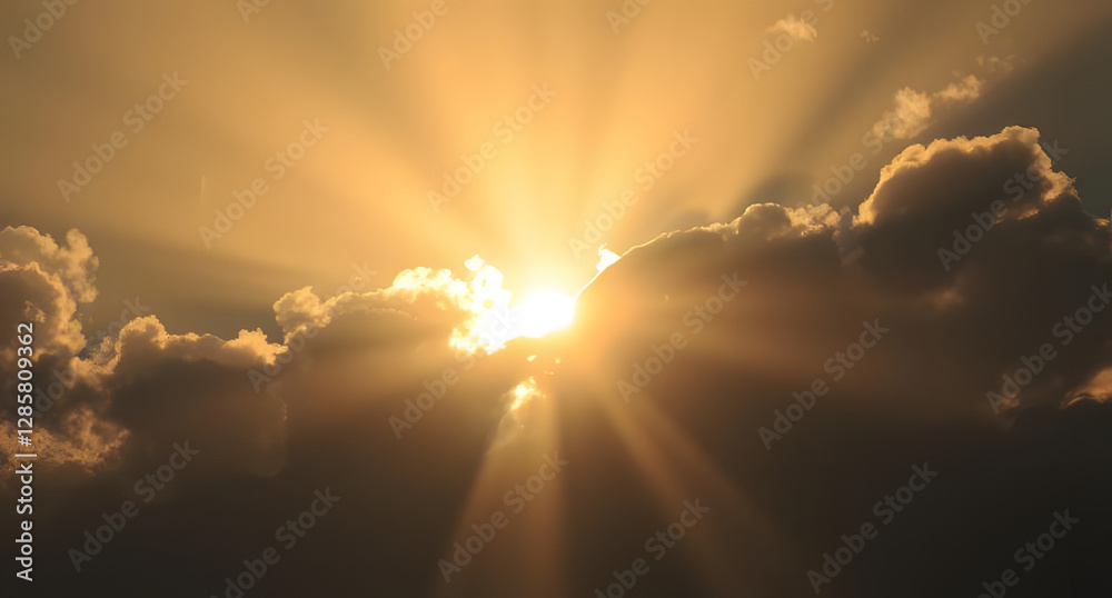 Fototapeta premium Sun rays piercing through dark clouds background. Dramatic beams of golden light breaking through