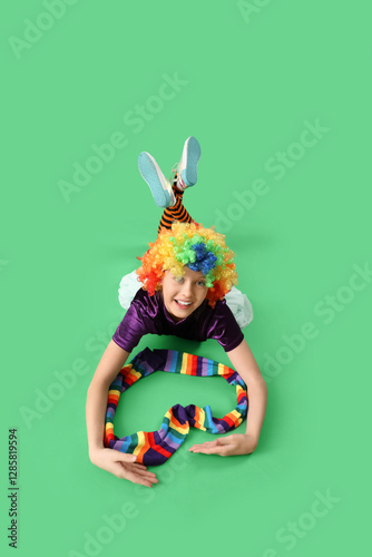 Funny girl in clown costume...