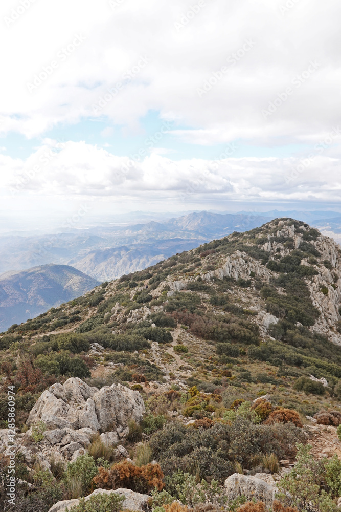The mountain panorama opening from the hiking path to pick Puig Campana, Finestrat, Benidorm, Spain The mountain panorama opening from the hiking path to pick Puig Campana, Finestrat, Benidorm, Spain