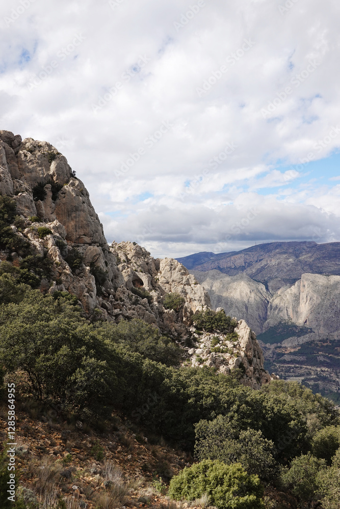 The mountain panorama opening from the hiking path to pick Puig Campana, Finestrat, Benidorm, Spain The mountain panorama opening from the hiking path to pick Puig Campana, Finestrat, Benidorm, Spain
