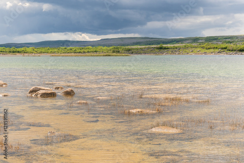 Lake in a karstic limestone landscape in The Burren, County Clare, Ireland. photo