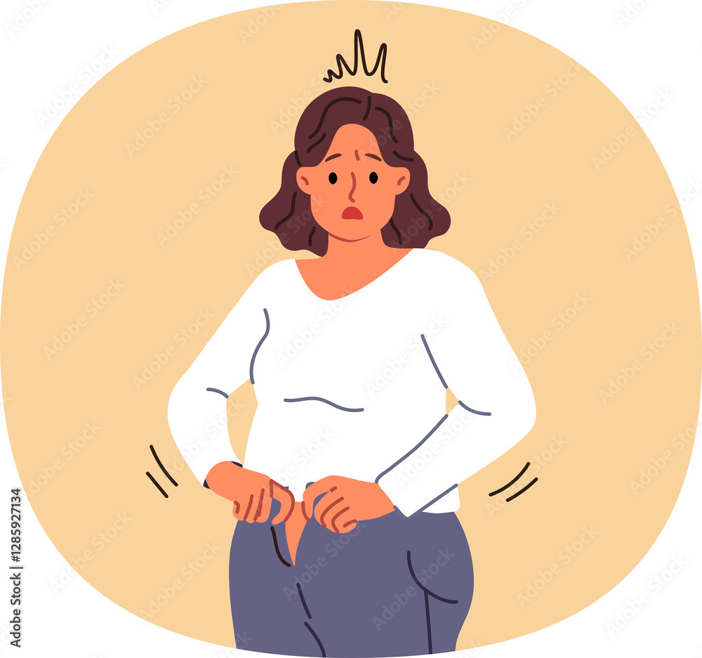 Overweight woman cannot fit into old jeans due to excess weight caused by overeating and sedentary lifestyle. Problem of excess weight surprises girl who needs to follow diet or exercise