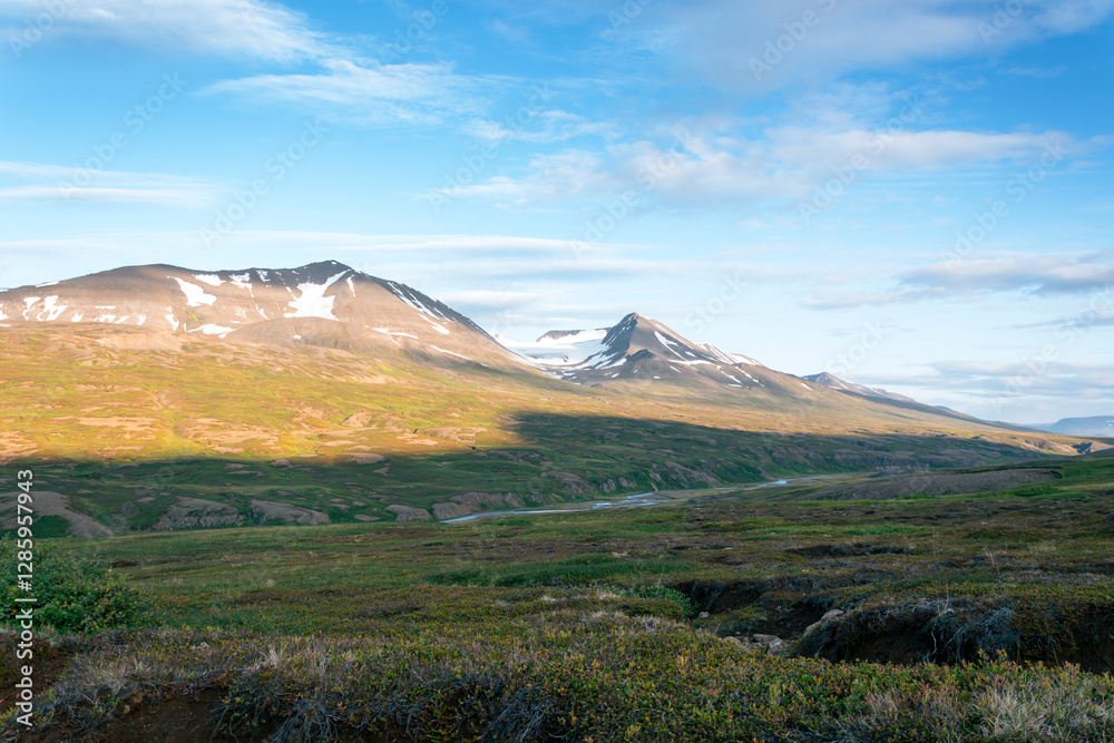 Icelandic landscape with mountains and a river in the foreground. Icelandic landscape with mountains and a river in the foreground.
