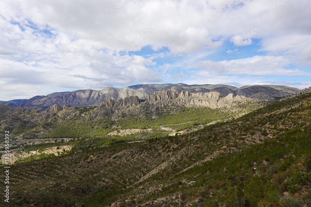 Naklejka premium The mountain panorama opening from the hiking path to pick Puig Campana, Finestrat, Benidorm, Spain