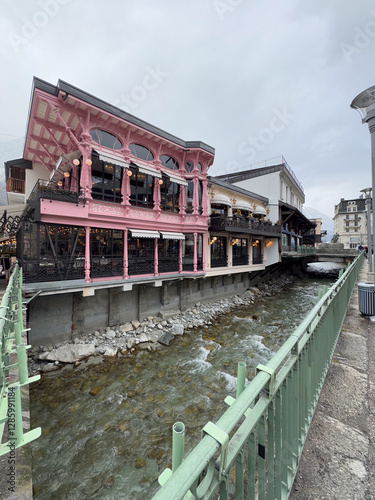 Charming Riverside Cafe with Elegant Architecture photo