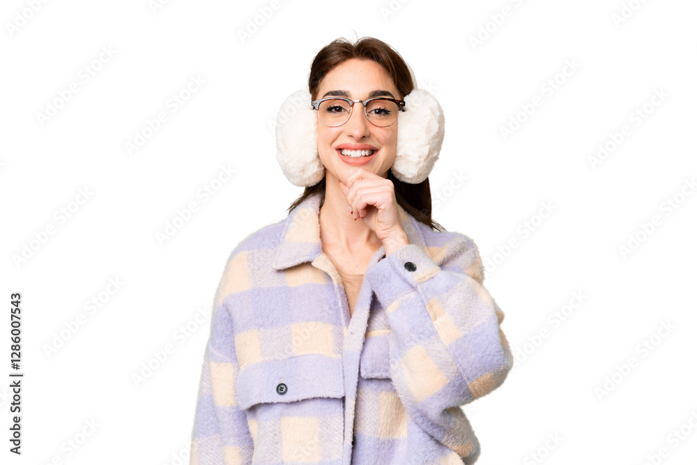 Young caucasian woman wearing winter muffs over isolated chroma key background with glasses and smiling Young caucasian woman wearing winter muffs over isolated chroma key background with glasses and smiling
