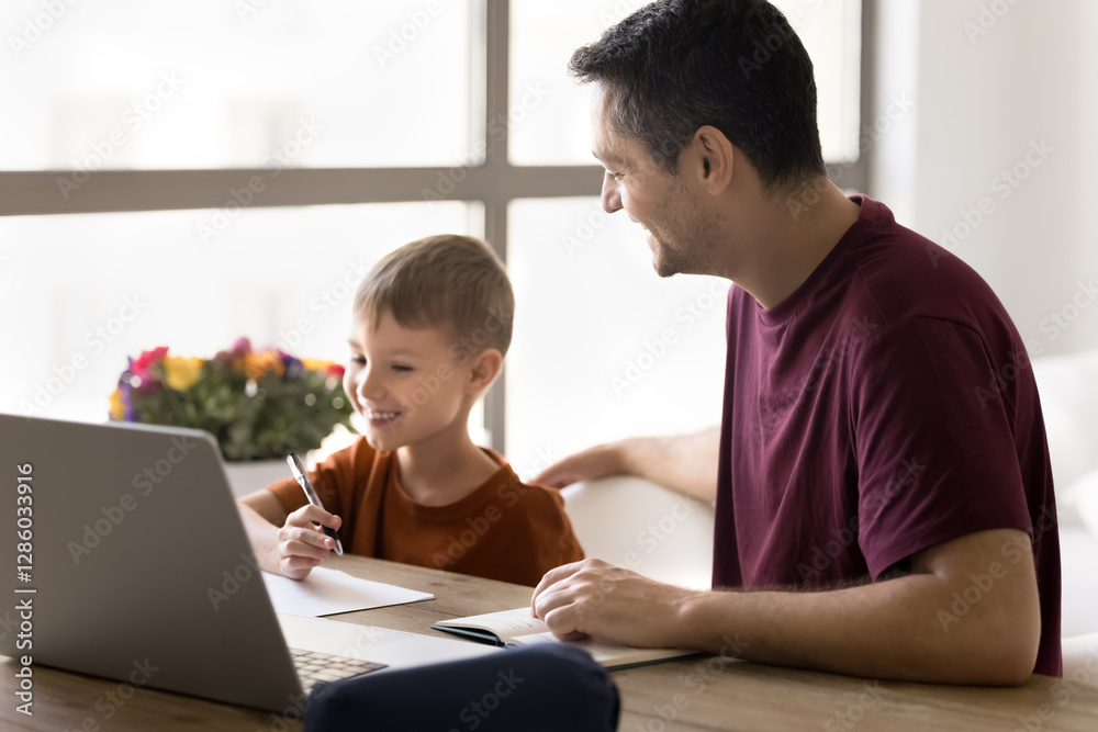 Smiling dad helps with online task to cute son, kid sit at table with laptop, holds pen, engaged in educational activity, remote learning, homeschooling through website or platform using modern device Smiling dad helps with online task to cute son, kid sit at table with laptop, holds pen, engaged in educational activity, remote learning, homeschooling through website or platform using modern device