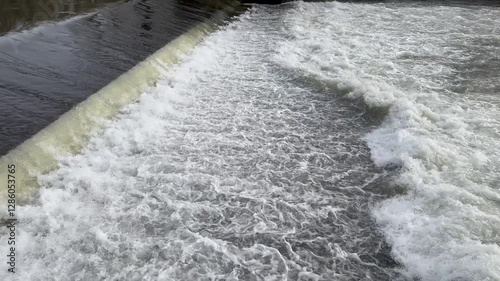 Water flows down a weir
