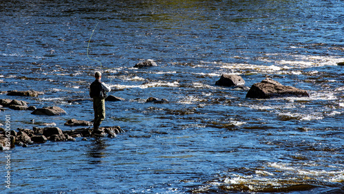 Salmon river landscape in a sunny summer. Farnebofjarden national park in north in Sweden. photo