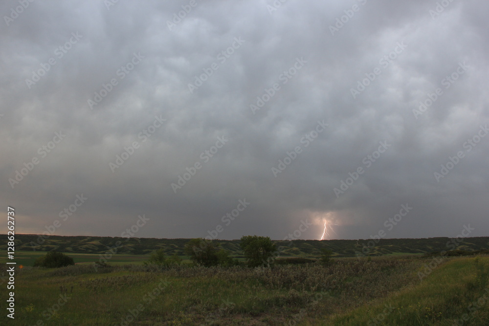 Wild Clouds and Lightning Over the Valley Wild Clouds and Lightning Over the Valley