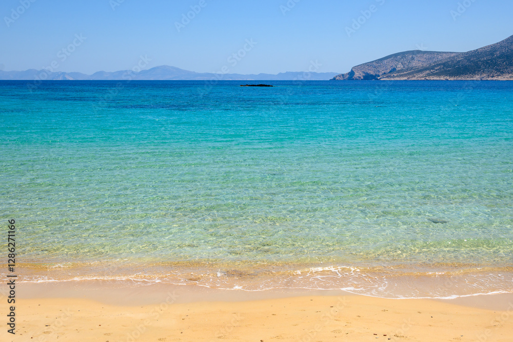 Ano Koufonisi. Finikas beach with sand and azure sea water. Small Cyclades, Greece