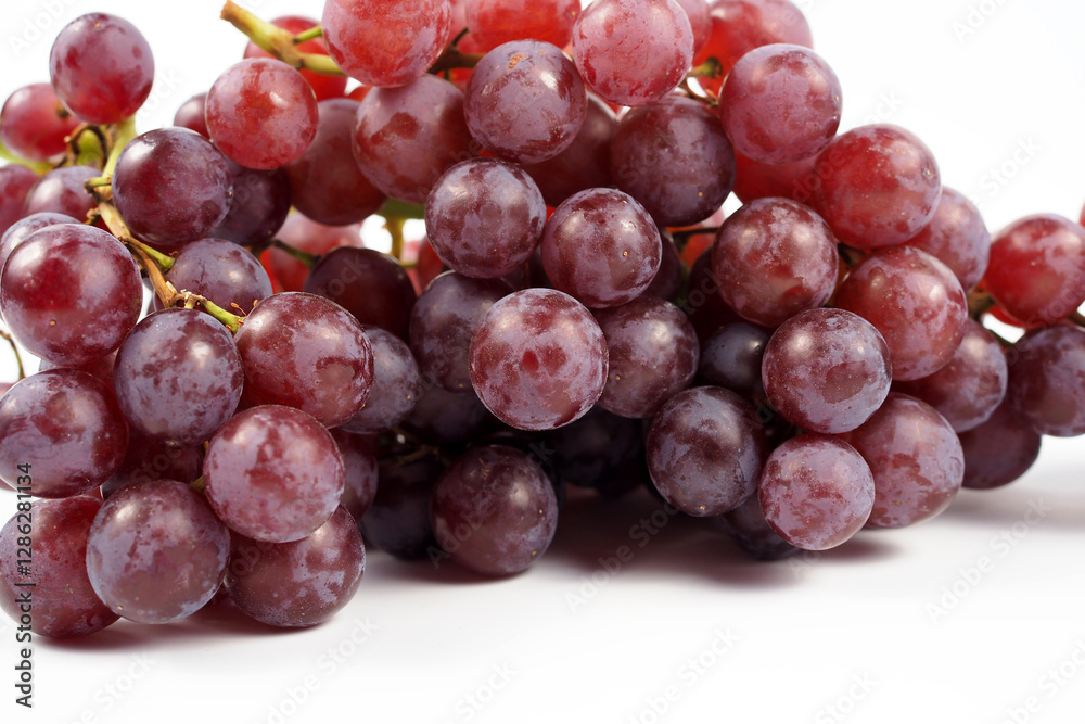Ripe red grape on a white background, freshness Ripe red grape on a white background, freshness