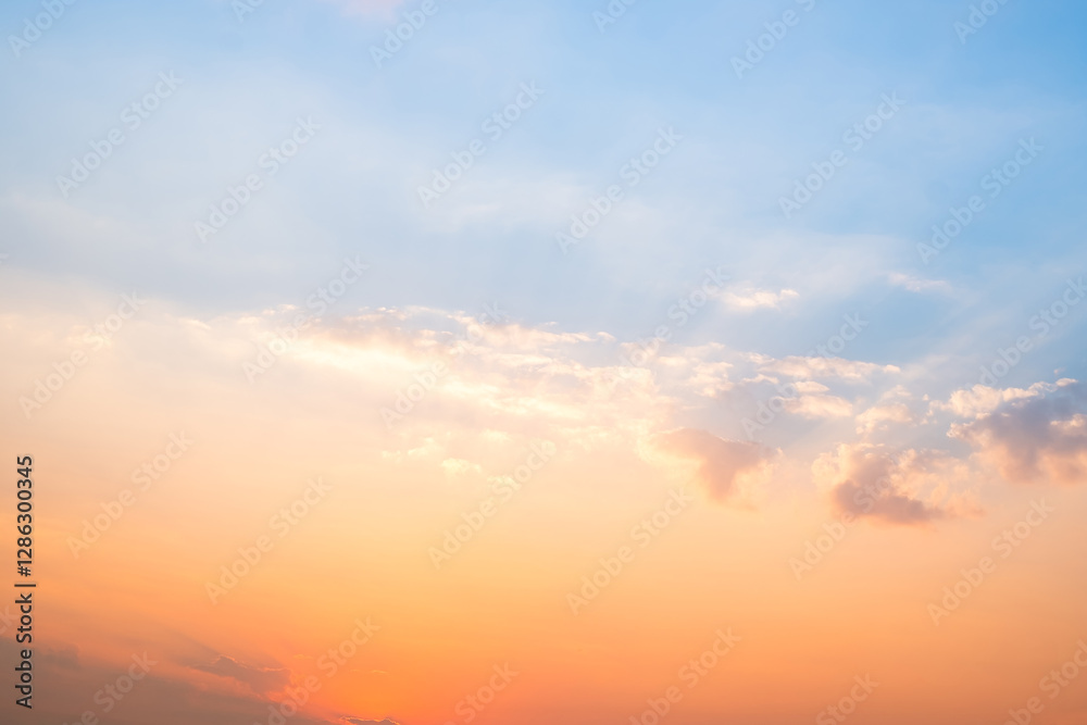 Beautiful , luxury soft gradient orange gold clouds and sunlight on the blue sky perfect for the background, take in evening,Twilight, Large size, high definition landscape photo Beautiful , luxury soft gradient orange gold clouds and sunlight on the blue sky perfect for the background, take in evening,Twilight, Large size, high definition landscape photo