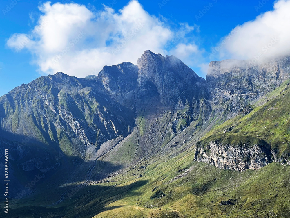 Fototapeta premium Rocky alpine peaks above Lake Melchsee or Melch Lake in the Uri Alps mountain massif, Kerns - Canton of Obwalden, Switzerland (Kanton Obwald, Schweiz)