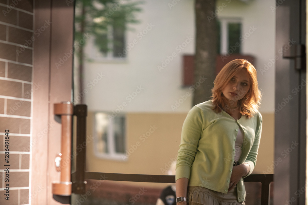Portrait of a young beautiful girl in an urban environment in summer. Portrait of a young beautiful girl in an urban environment in summer.