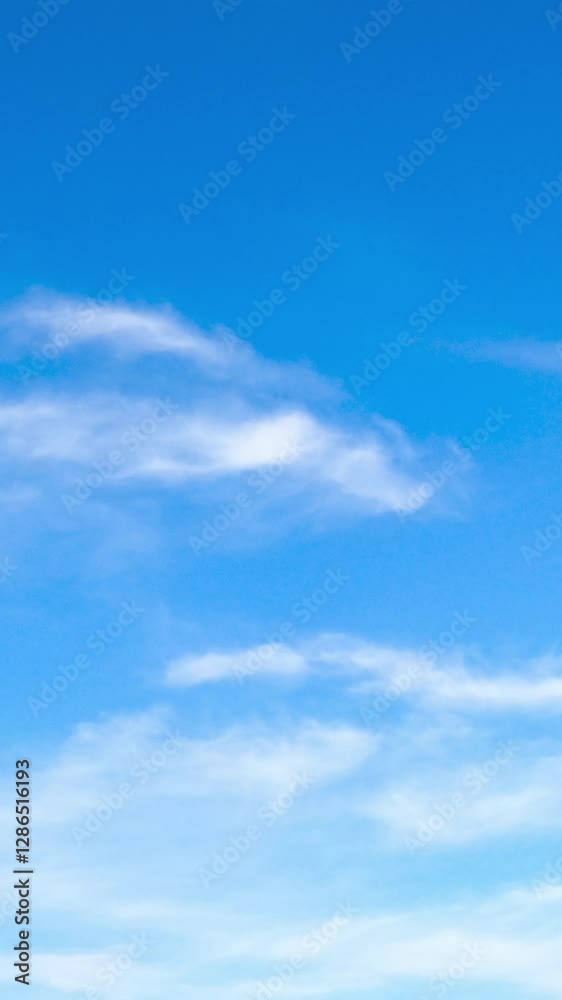 Amazing azure horizon with tiny threads of clouds. Summer day sky from low angle view. Timelapse. Vertical video Amazing azure horizon with tiny threads of clouds. Summer day sky from low angle view. Timelapse. Vertical video