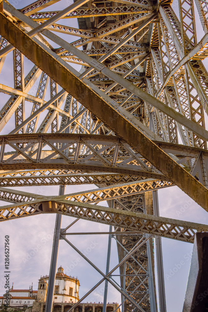 Sunlit Symmetry: The Intricate Ironwork of Dom Luis Bridge in Porto Sunlit Symmetry: The Intricate Ironwork of Dom Luis Bridge in Porto