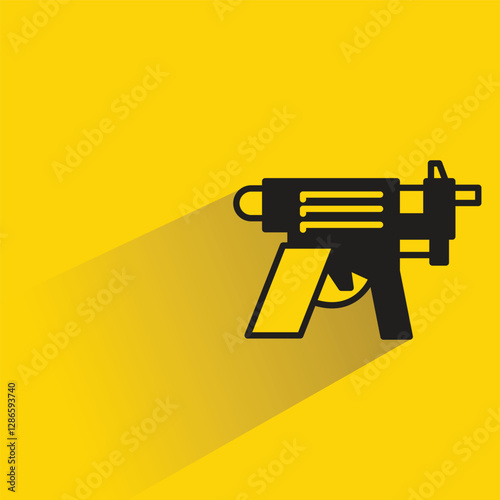 futuristic blaster gun on yellow background