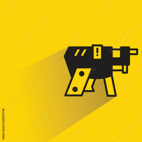 futuristic blaster gun on yellow background