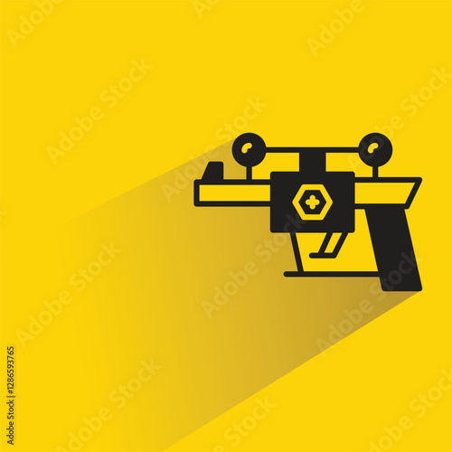 futuristic blaster gun on yellow background