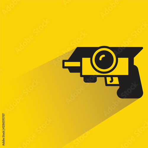 futuristic blaster gun on yellow background