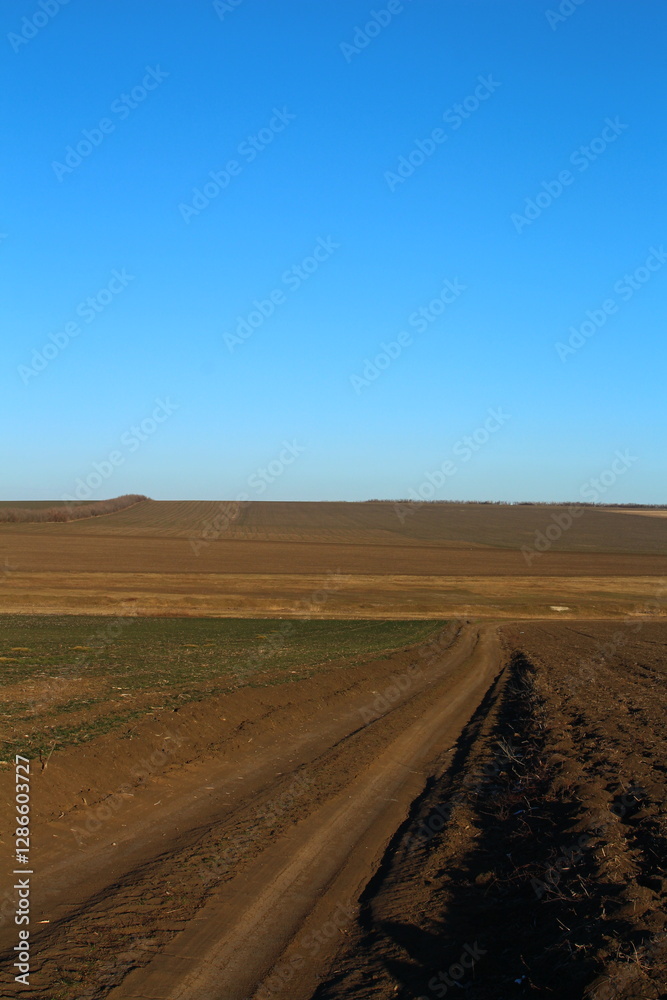 A sign in the middle of a desert