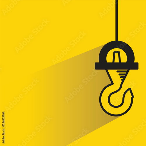 hoist crane hook icon with shadow on yellow background