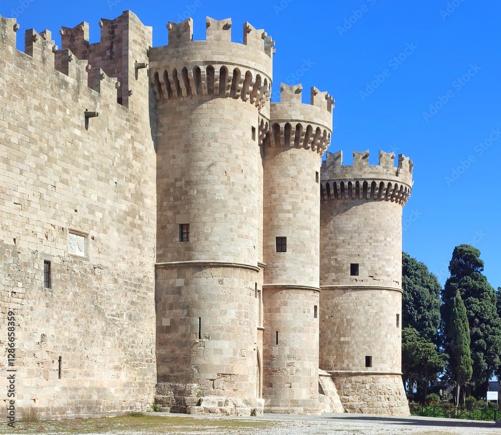 Exterior view of the Palace of the Grand Master of the Knights of Rhodes, a castle restored in 1940 by the Italians, now housing museums showcasing ancient and medieval Rhodes history. Exterior view of the Palace of the Grand Master of the Knights of Rhodes, a castle restored in 1940 by the Italians, now housing museums showcasing ancient and medieval Rhodes history.
