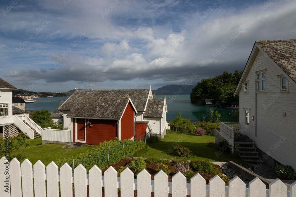 Cozy norwegian houses at the enchanted coastal viallage of skanevik in Rogaland.