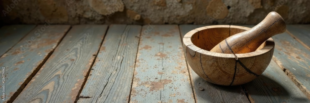 Wooden mortar with ceramic pestle on stone floor, distressed, wooden, floor Wooden mortar with ceramic pestle on stone floor, distressed, wooden, floor